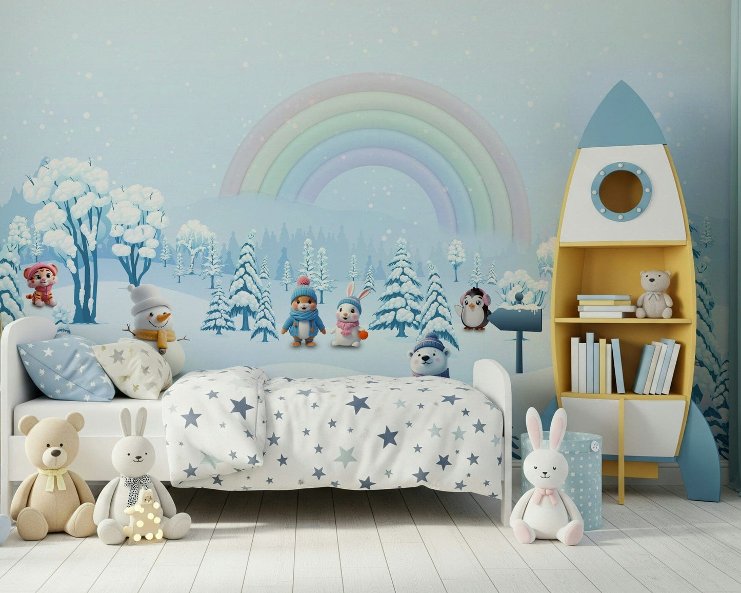 Toddler room reading corner with winter friends rainbow mural.