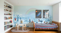 Modern apartment nursery with rainbow wall mural, warm color accents and simple wall decor