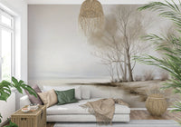 A tranquil snowy-shore wallpaper featuring slender trees against a muted winter sky.