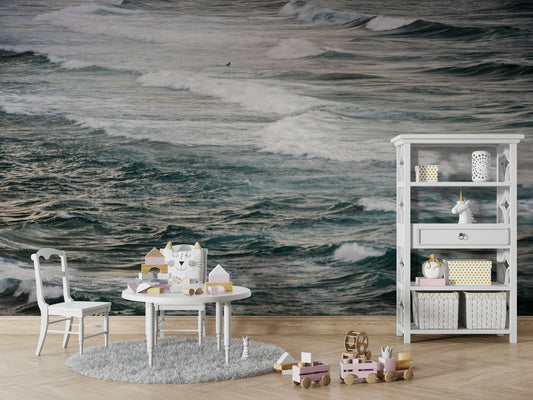 A high-angle view of the wall mural in a large space.

