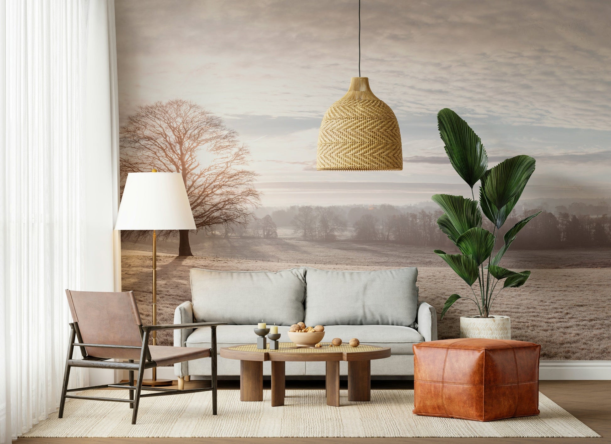 Snowy forest wall decor behind sofa, muted color palette, calm modern style