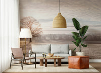 Snowy forest wall decor behind sofa, muted color palette, calm modern style