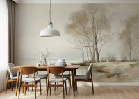 A serene winter shoreline wallpaper featuring soft, misty trees along a quiet coastal landscape.