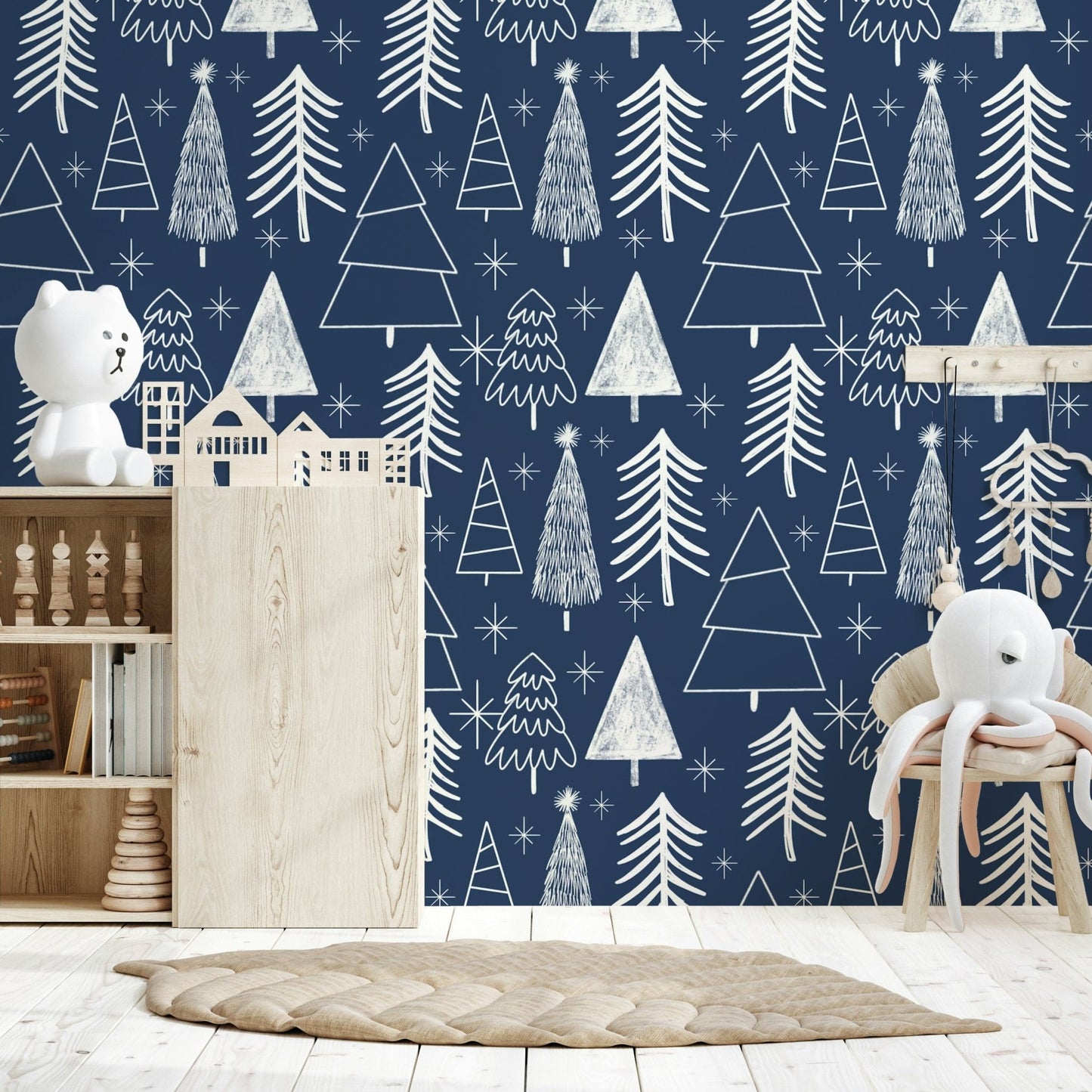 A cozy winter wallpaper showcasing minimalist white tree illustrations on a dark backdrop.