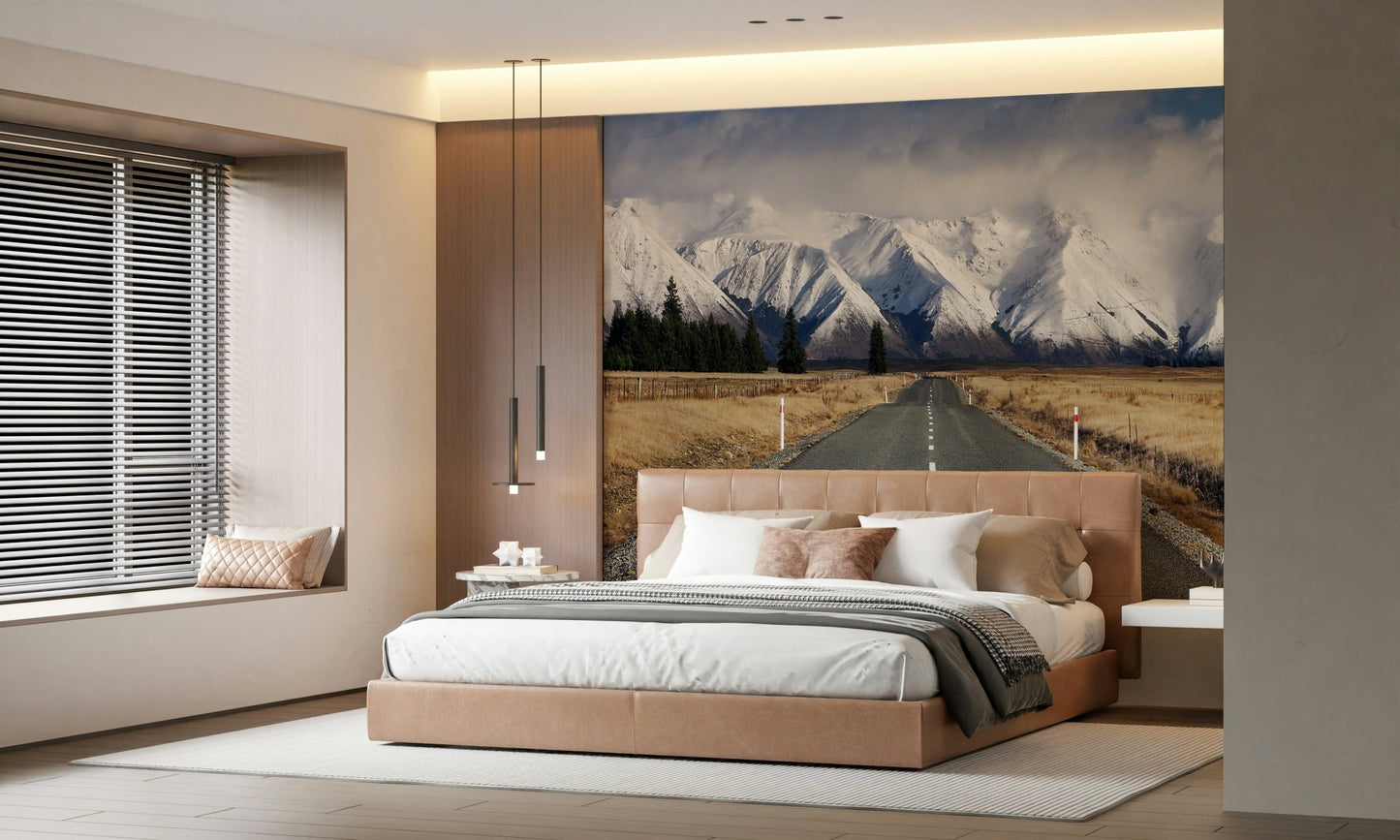Winter's Road Wall Mural in living room, snowy lane and trees, cool-toned modern wall decor