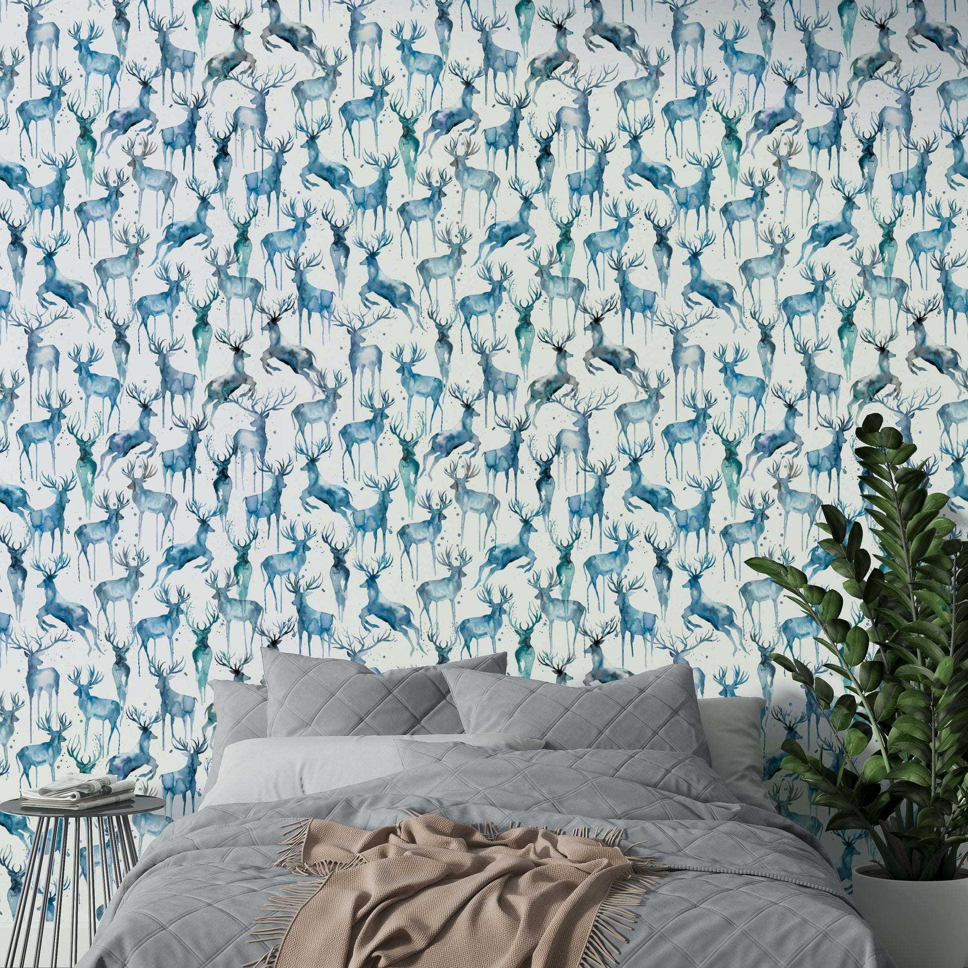 Blue artistic deer wall mural paired with light wood furniture in a den.