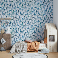 Wintery Artistic Deers Blue Wallpaper used as a focal point in a minimalist entryway.