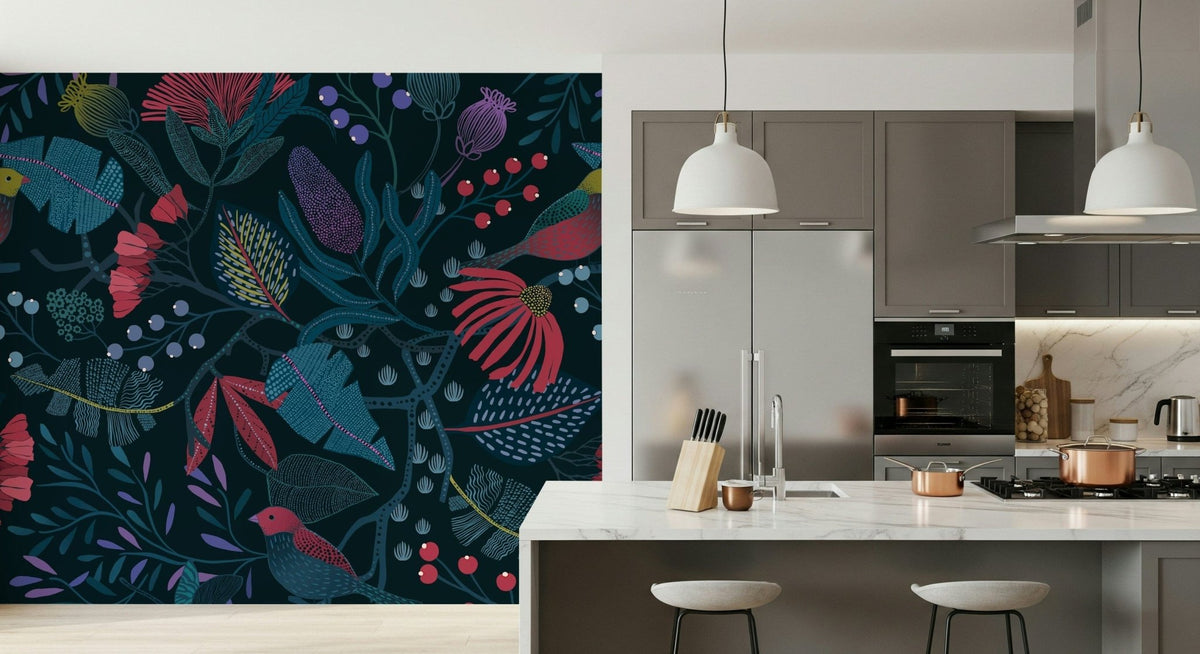 Wonderforest wallpaper mural with pink flowers on navy foliage on a kitchen wall by a marble island