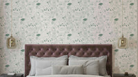 Woodland animal wallpaper in neutral green tones

