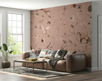 Whimsical mural of woodland trees and soft greenery in a tranquil setting