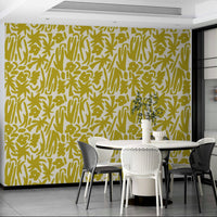 A kitchen decorated with bright yellow wallpaper

