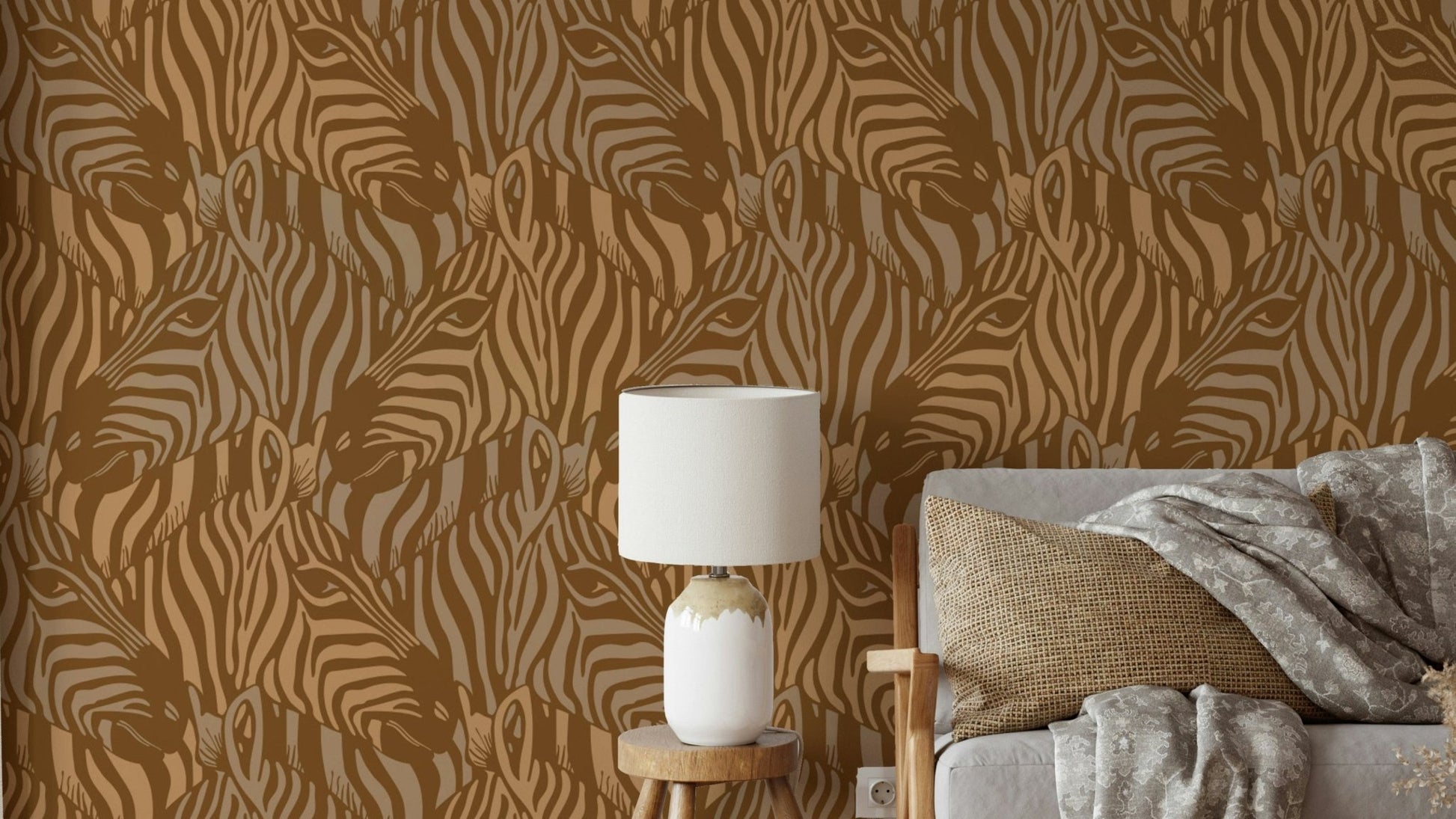 A wall mural of a zebra herd with artistic stripes.

